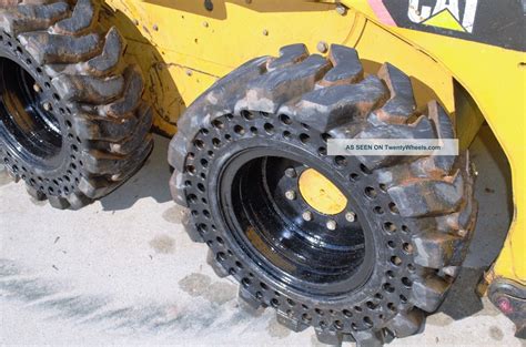 cat skid steer snow tires|cat skid steer solid tires.